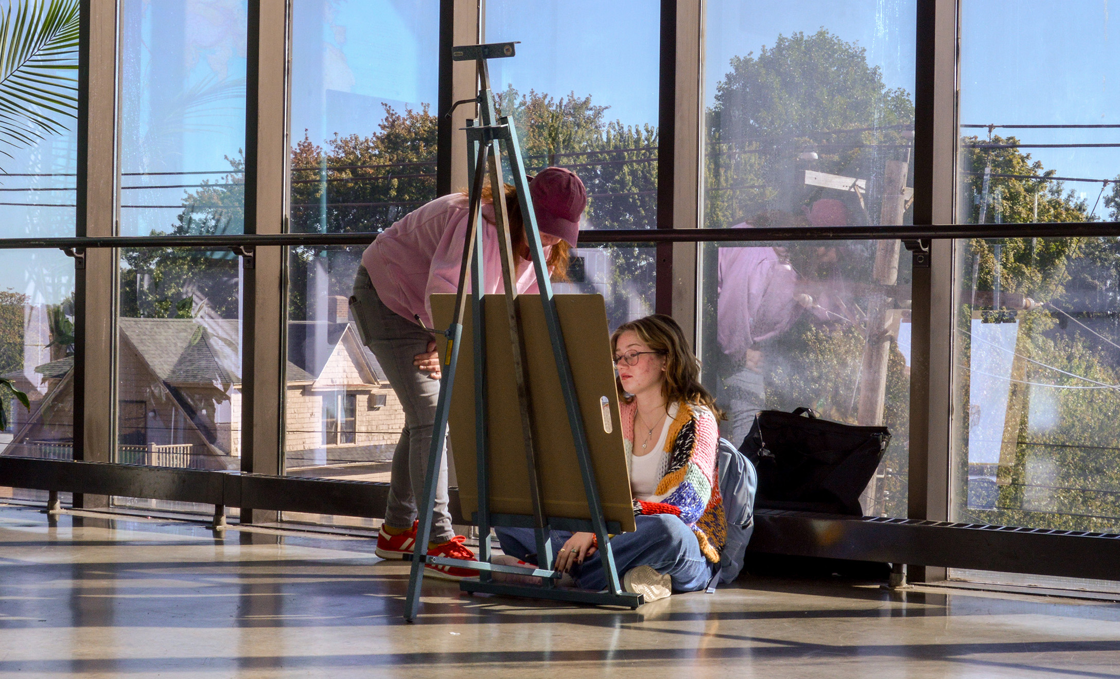 UNH Professor Jess Peck with student in Visual Thinking class
